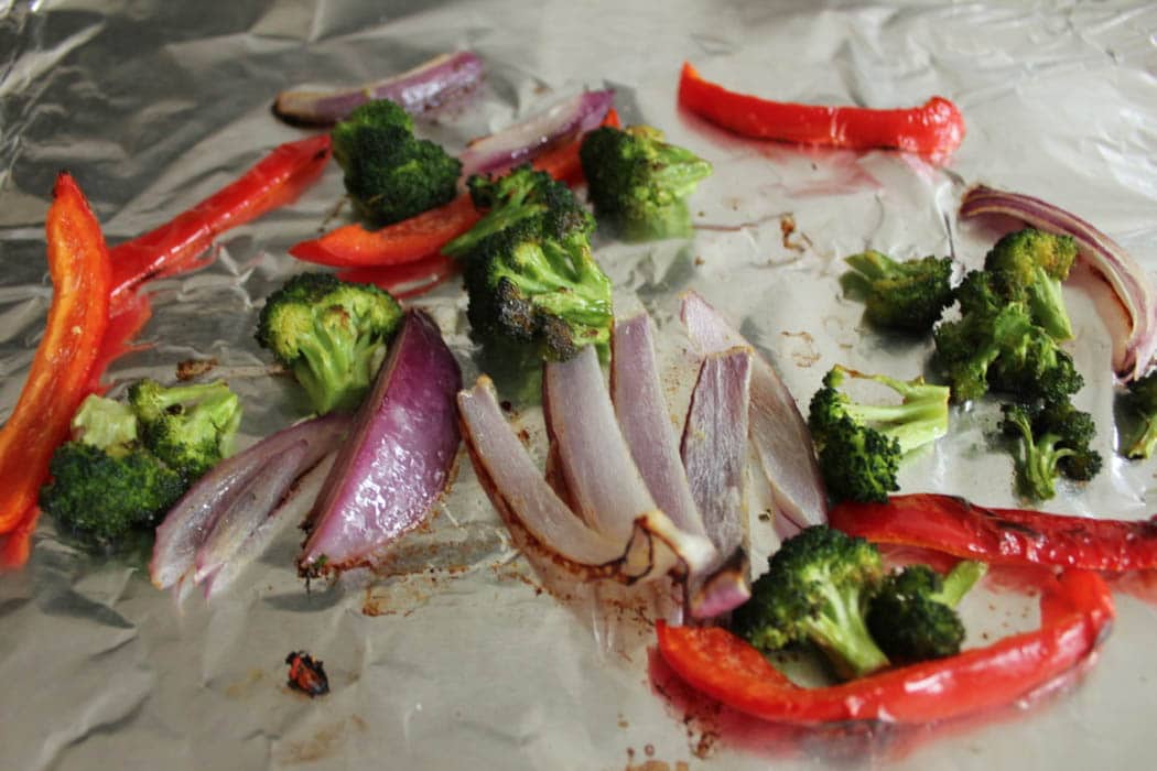 Roasted vegetable topping for cauliflower pizza crust with roasted vegetables and goat cheese