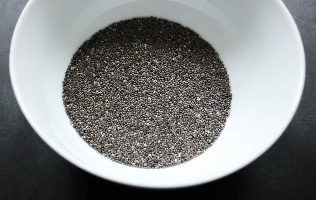 Bowl of black chia seeds.