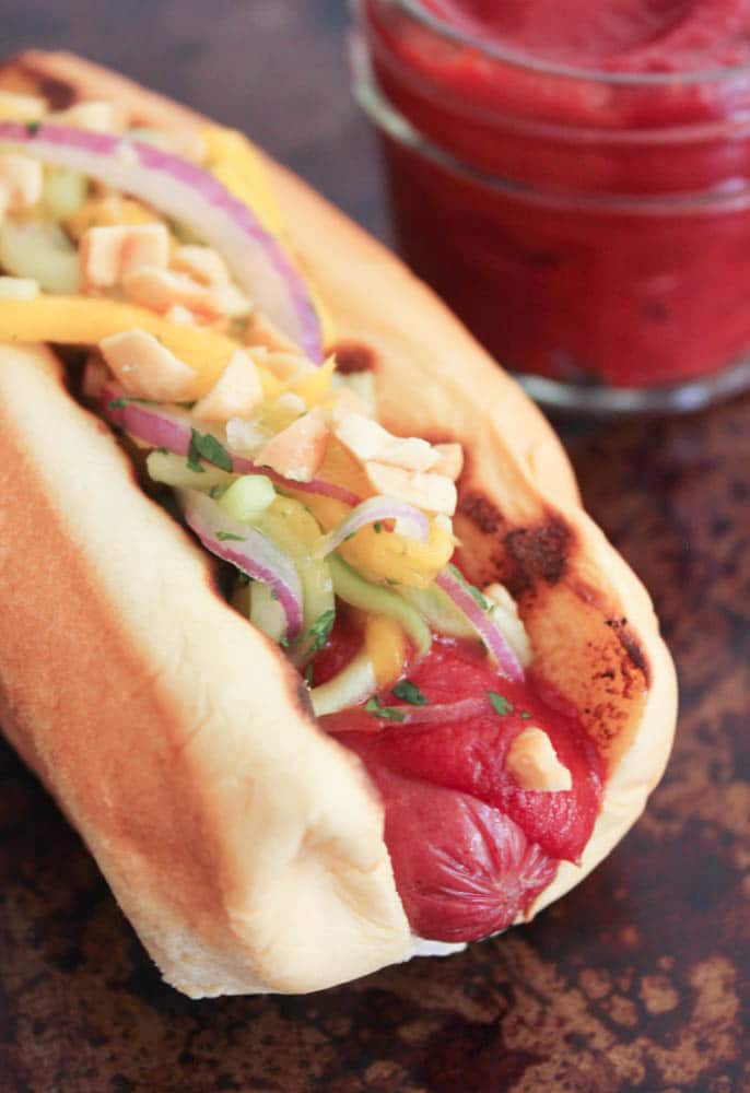 Hot Dogs with Cucumber-Mango Slaw and Homemade Srirachup - Domesticate ME