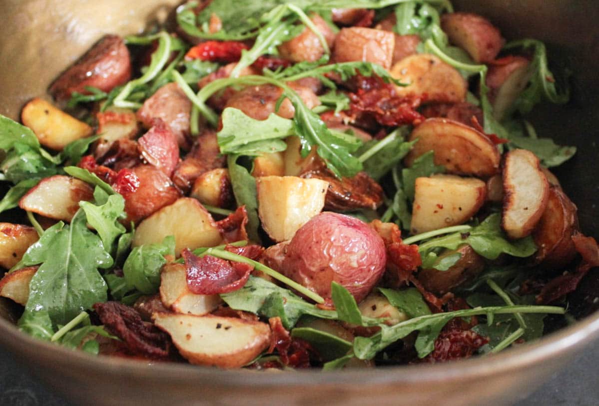warm-roasted-potato-salad-with-pancetta-sun-dried-tomatoes-and-arugula-step-8