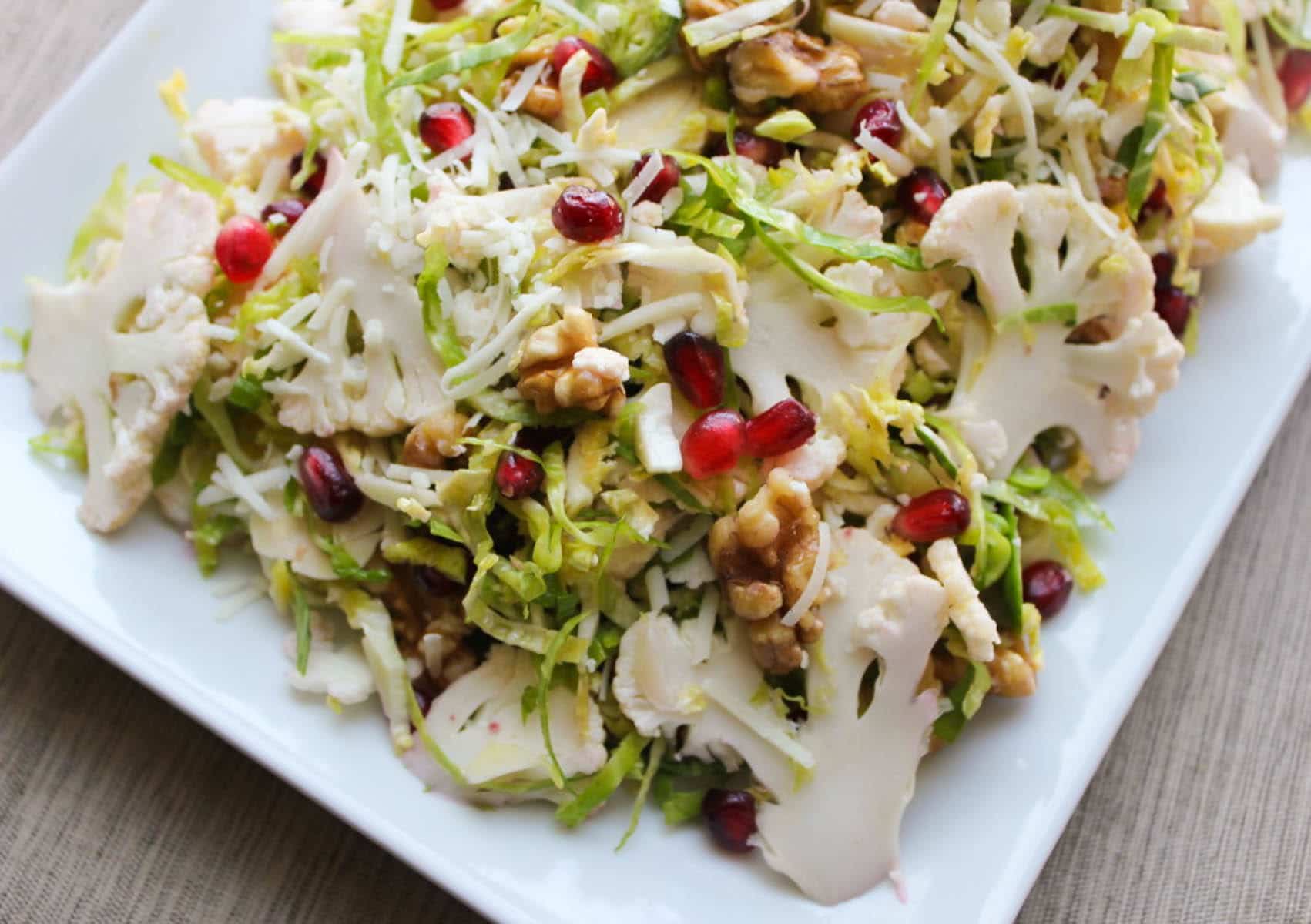 Shaved-Brussels-Sprout-and-Cauliflower-Salad-with-Pomegranate-Walnuts-Pecorino