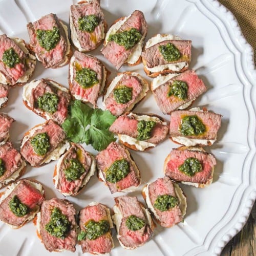 Beef Tenderloin Crostini with Whipped Goat Cheese and Pesto