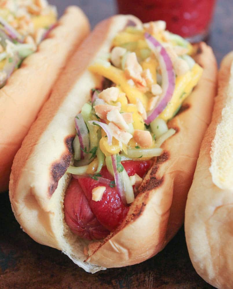Hot Dogs with Cucumber-Mango Slaw and Homemade Srirachup