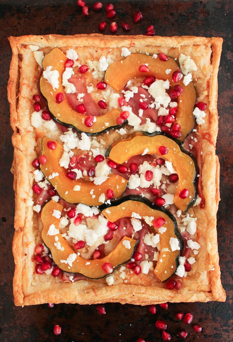 Acorn Squash Tart with Prosciutto and Pomegranate baked and unsliced.