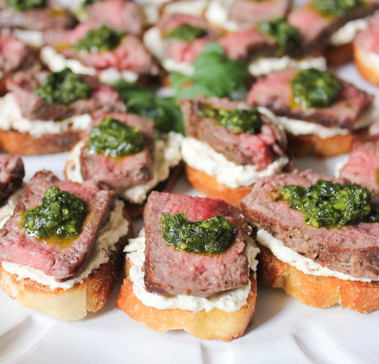 beef-tenderloin-crostini-with-whipped-goat-cheese-and-pesto-20