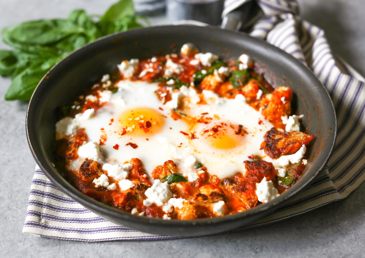 5-ingredient Skillet Eggs with Spinach and Roasted Cauliflower 