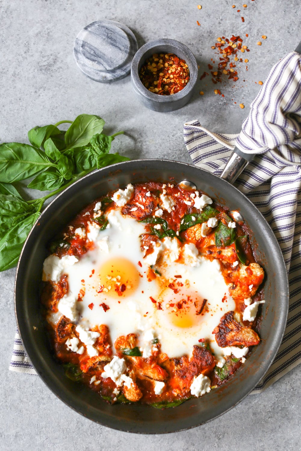 20 Satisfying Vegetarian Recipes- Skillet Eggs with Spinach and Roasted Cauliflower